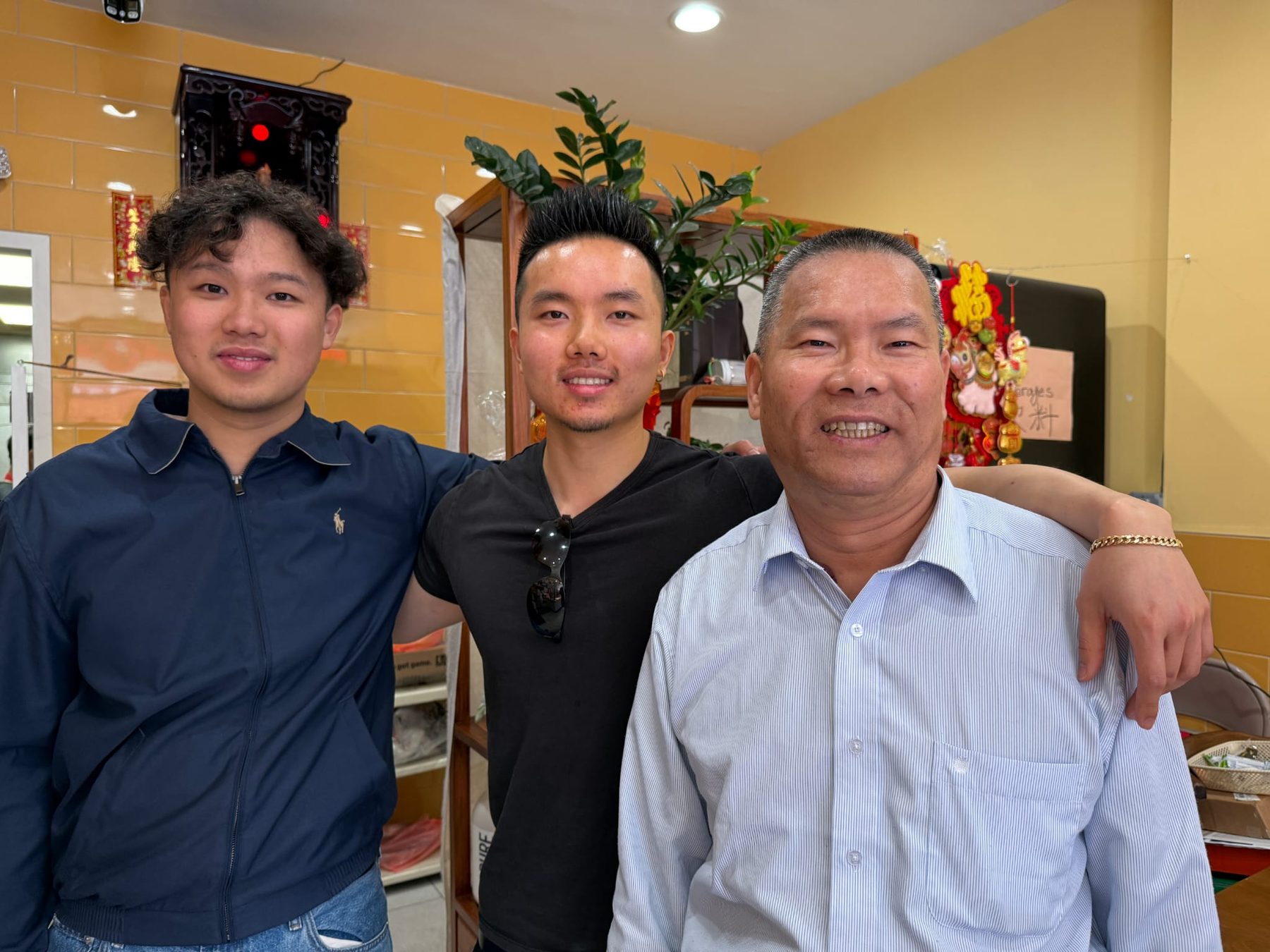 Three generations of a Chinatown family in their shop